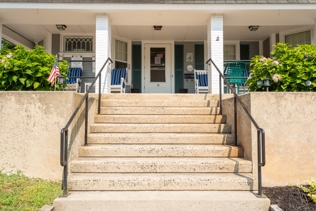 Photo of the front steps and front door of the Girdler House